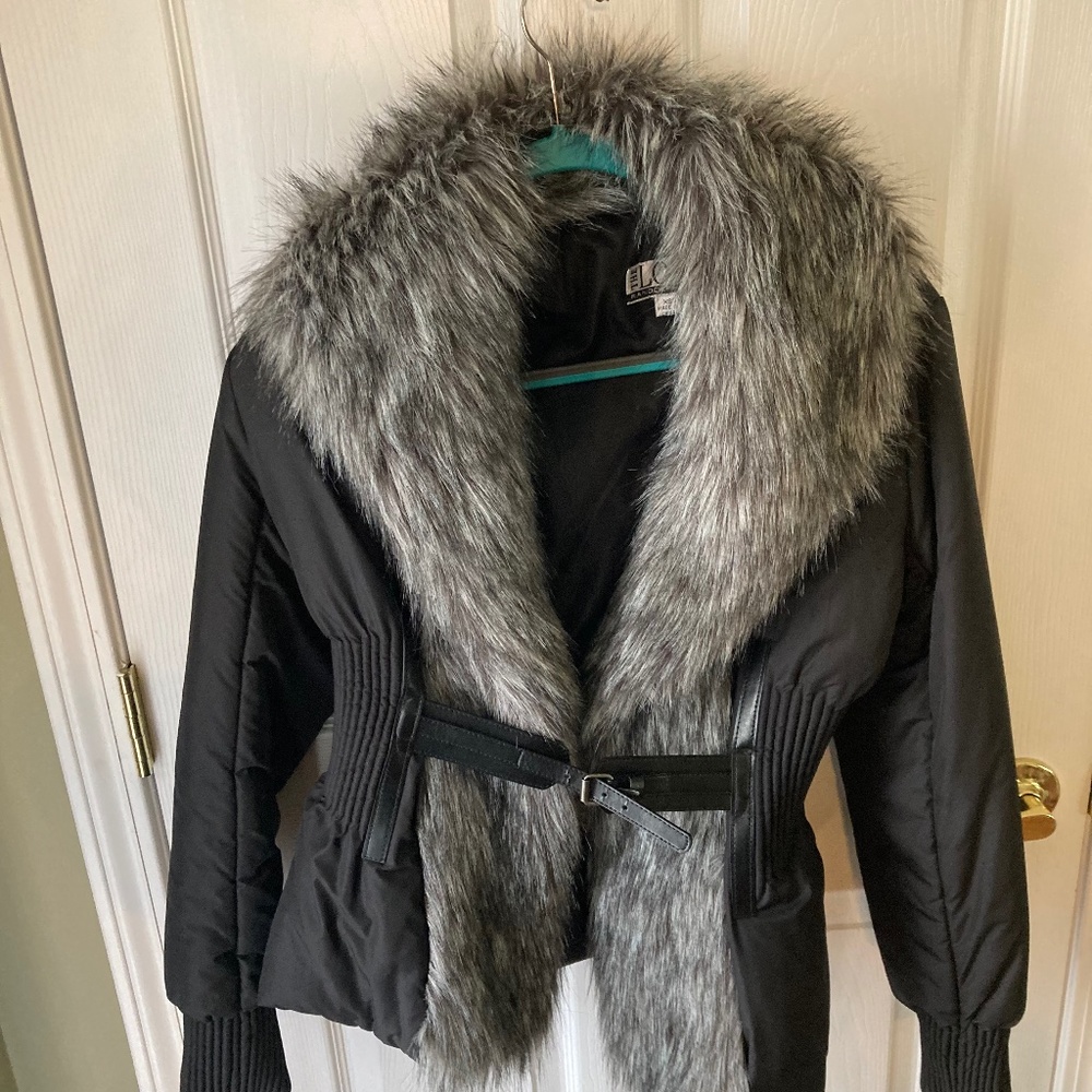 Black bomber jacket with faux fur collar and front by waist